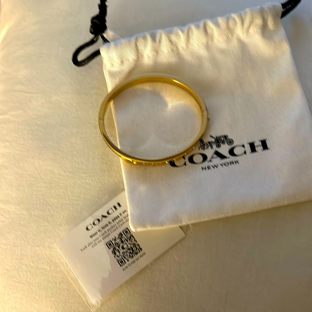 COACH Gold tone Hinge Brac with Clasp 
NEVER WORN